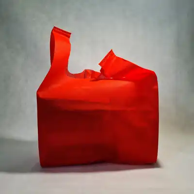 Tote bag spunbond merah dengan sablon kustom